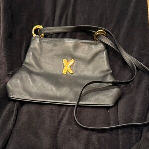 Paloma Picasso Black Leather Handbag with Gold Accents